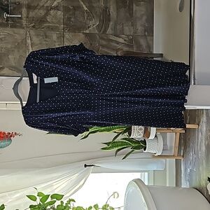 Navy blue dress with white poca dots.